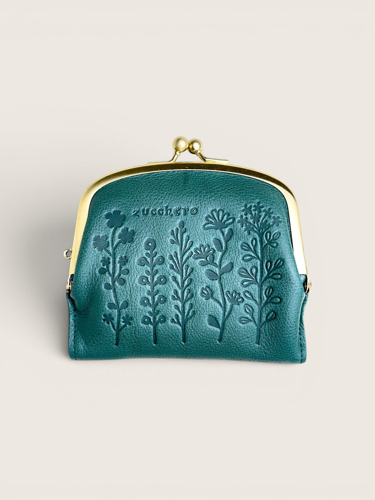 Teal oil-shrink leather clasp wallet with wildflowers pressed into the front and a bright brass coin frame.