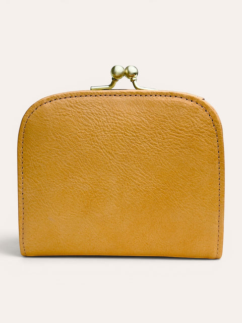 A small mustard yellow leather wallet with a gold-tone metal clasp closure, shown against a plain light beige background.