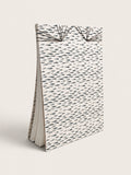 Ourooh A5 notebook featuring a white cover with black cypress sprig pattern and decorative Japanese-style fan binding. handmade by a french artist