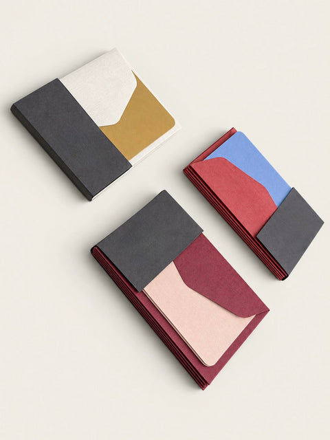 Three Le Typographe mini card and envelope sets in burgundy, blue, mustard and ivory paper