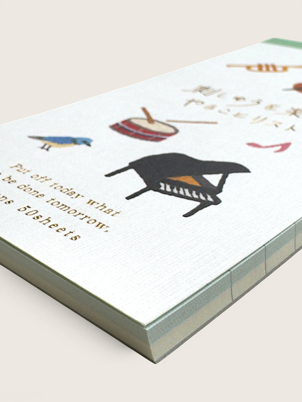 Ourooh Japanese music-themed to-do list pad with illustrated instruments, a blue bird, and gold text on white paper.